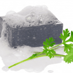 Image of cilantro with soap and bubbles