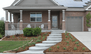 Front of brick house with landscaping