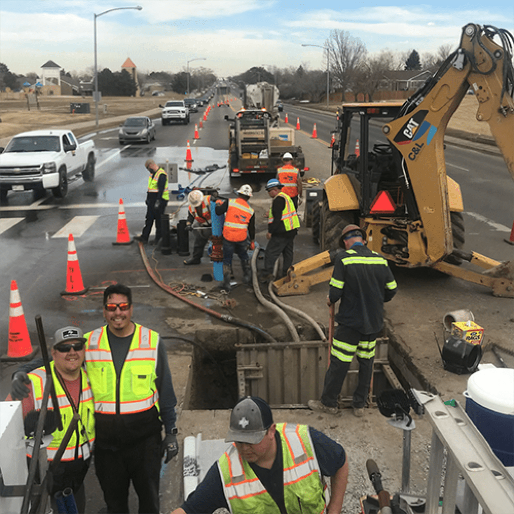 Construction workers working on street